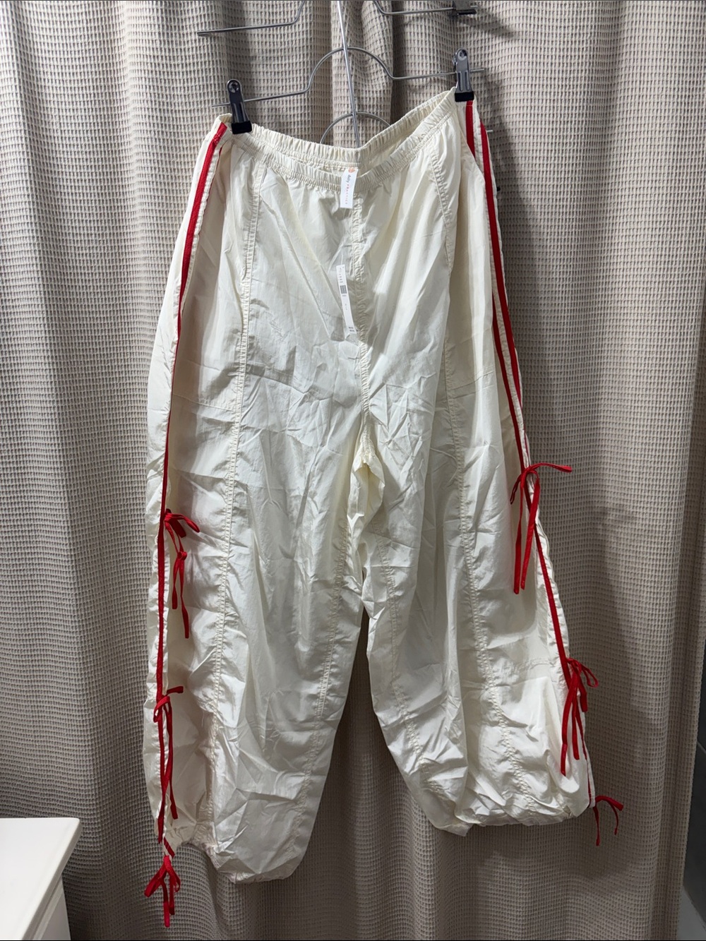 Anthropologie Cream  and red  jogger parachute Pants with Red Ties nwt